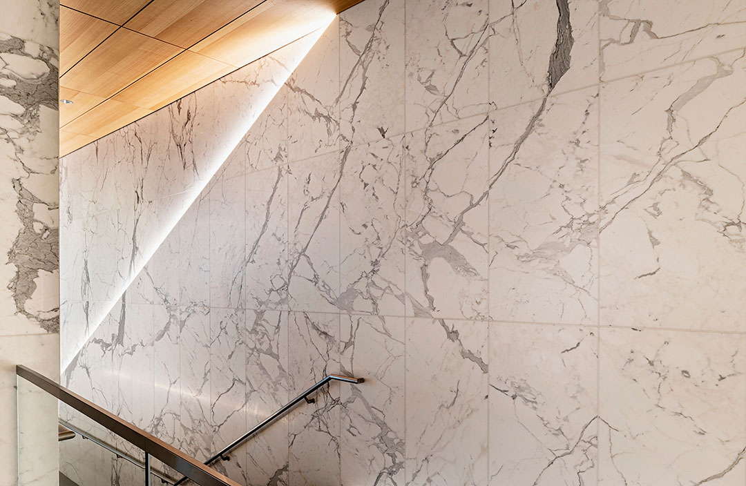 Close-up view of the 2000 L Street Alexander Court project, showcasing intricate stonework and architectural detailing by Rugo Stone.