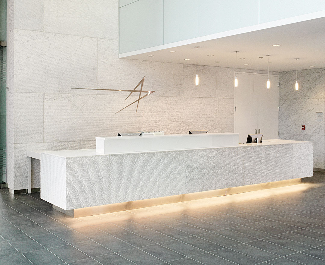 Lobby design at Lockheed Martin, showcasing Rugo Stone's fine stonework and craftsmanship.