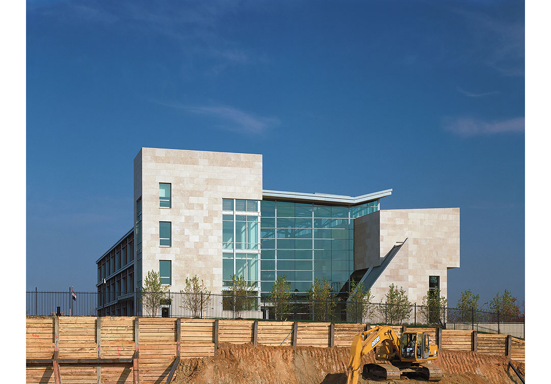 Close-up view of the Nigerian Chancery, showcasing the fine stone craftsmanship and architectural details by Rugo Stone.