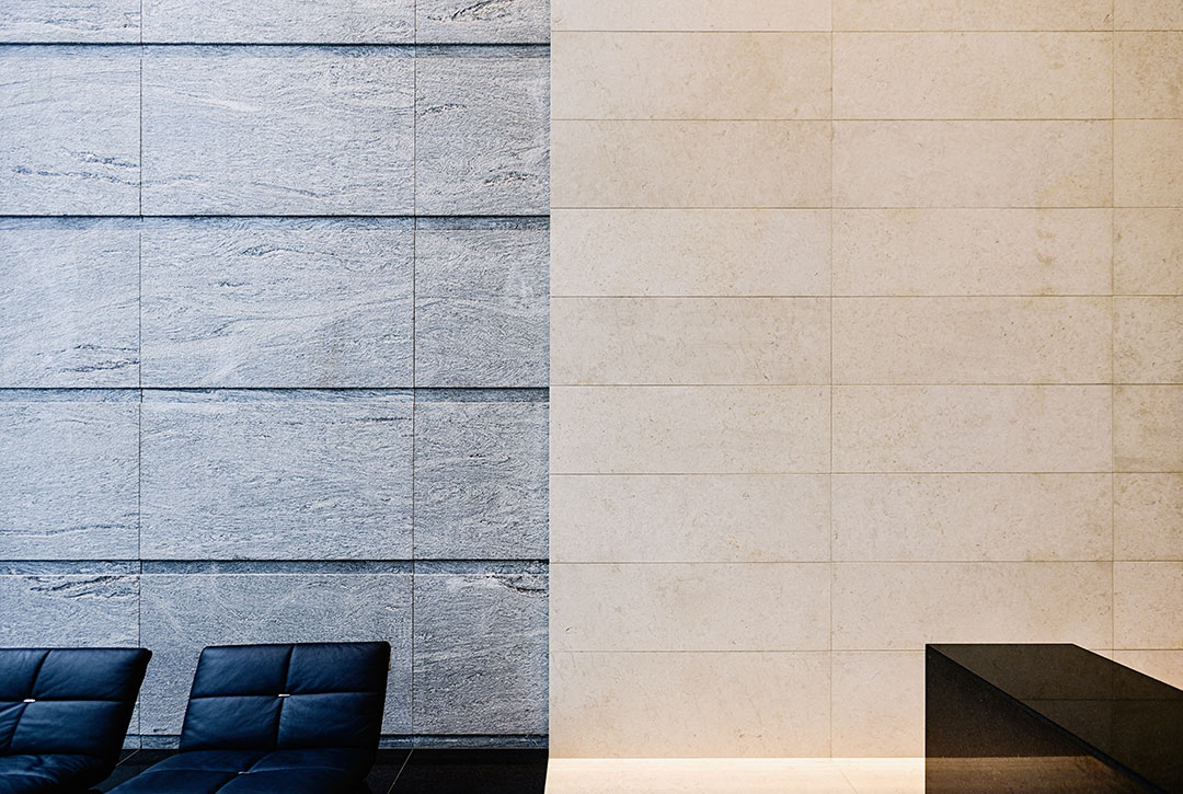 Detailed view of the lobby at Rugo Stone's 600 Massachusetts project, showcasing fine stonework and architectural design.