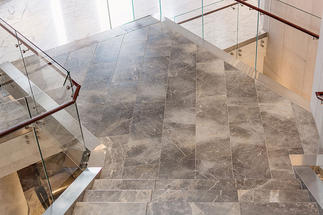 Detailed view of the Rugo Stone CSIS project, emphasizing the precision stonework and architectural features.