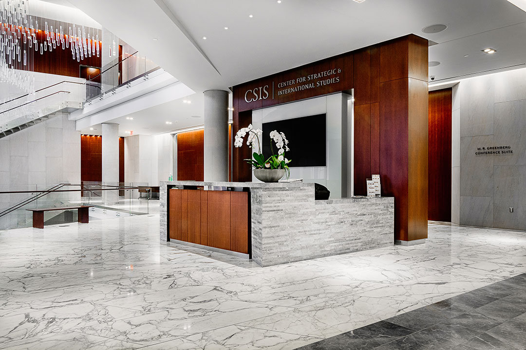 Close-up view of the Rugo Stone CSIS project, showcasing intricate stonework and architectural details.