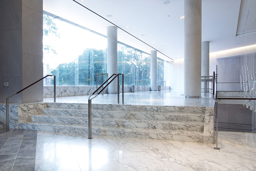 Wide view of the Rugo Stone CSIS project, highlighting the fine craftsmanship in stonework and architectural design.