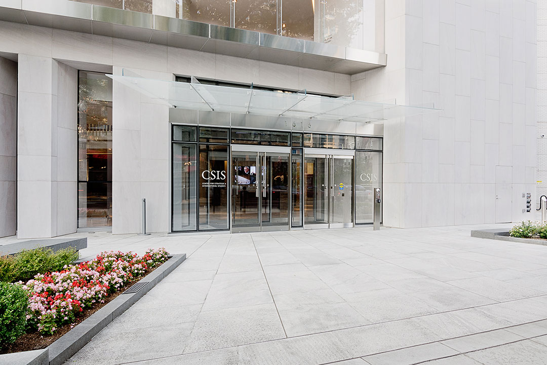 Another view of the Rugo Stone CSIS project, emphasizing the precision stonework and architectural details.