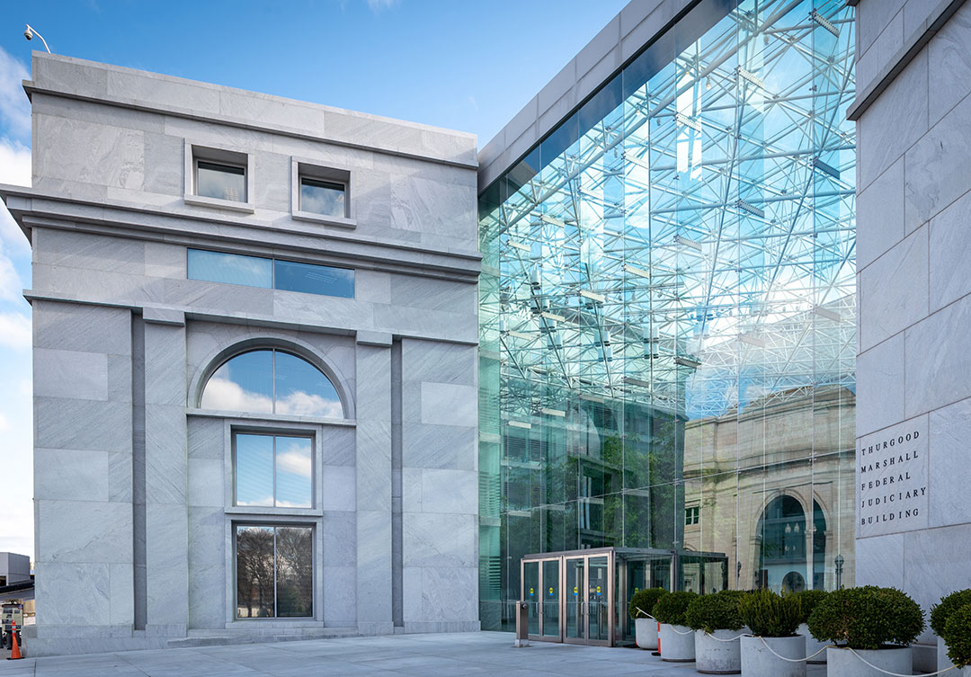 Rugo Stone installation at the Thurgood Marshall building, highlighting detailed stonework and architectural refinement.