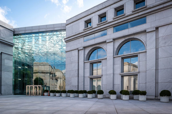 Rugo Stone Installation At The Thurgood Marshall Building, Highlighting Detailed Stonework And Refined Architectural Design.