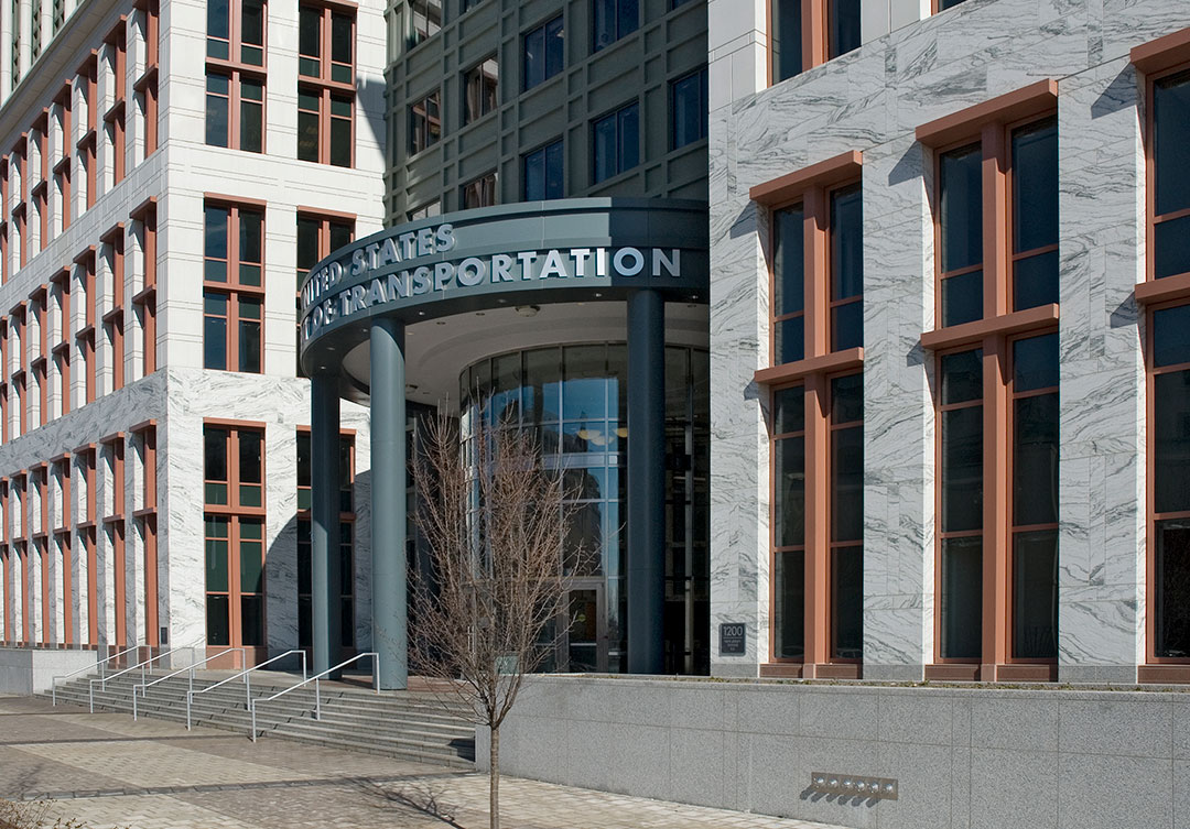 Rugo Stone installation at the USDOT Headquarters, highlighting intricate stonework and architectural elegance.