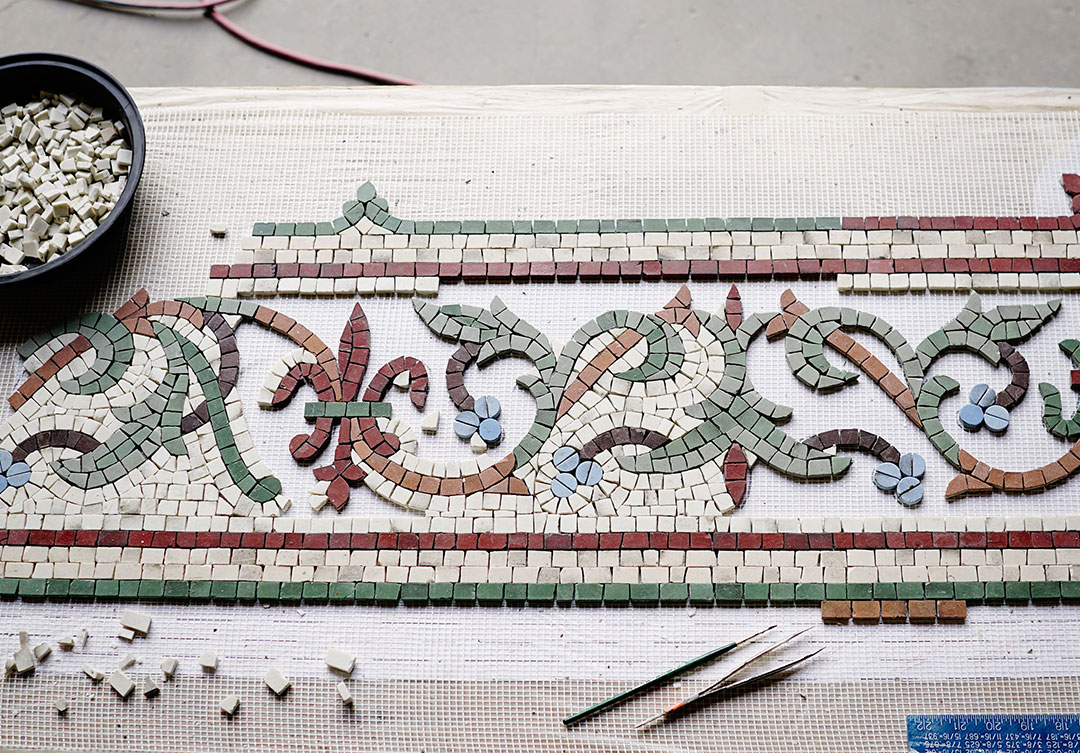 Close-up view of the intricate mosaic at Basilica Co-Cathedral of the Sacred Heart, focusing on its detailed artistry and vibrant colors.