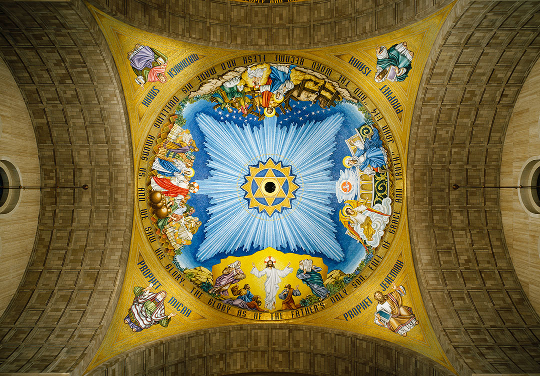 Mosaic artwork at the Knights of Columbus Incarnation, showcasing intricate detailing and rich colors in stone craftsmanship.