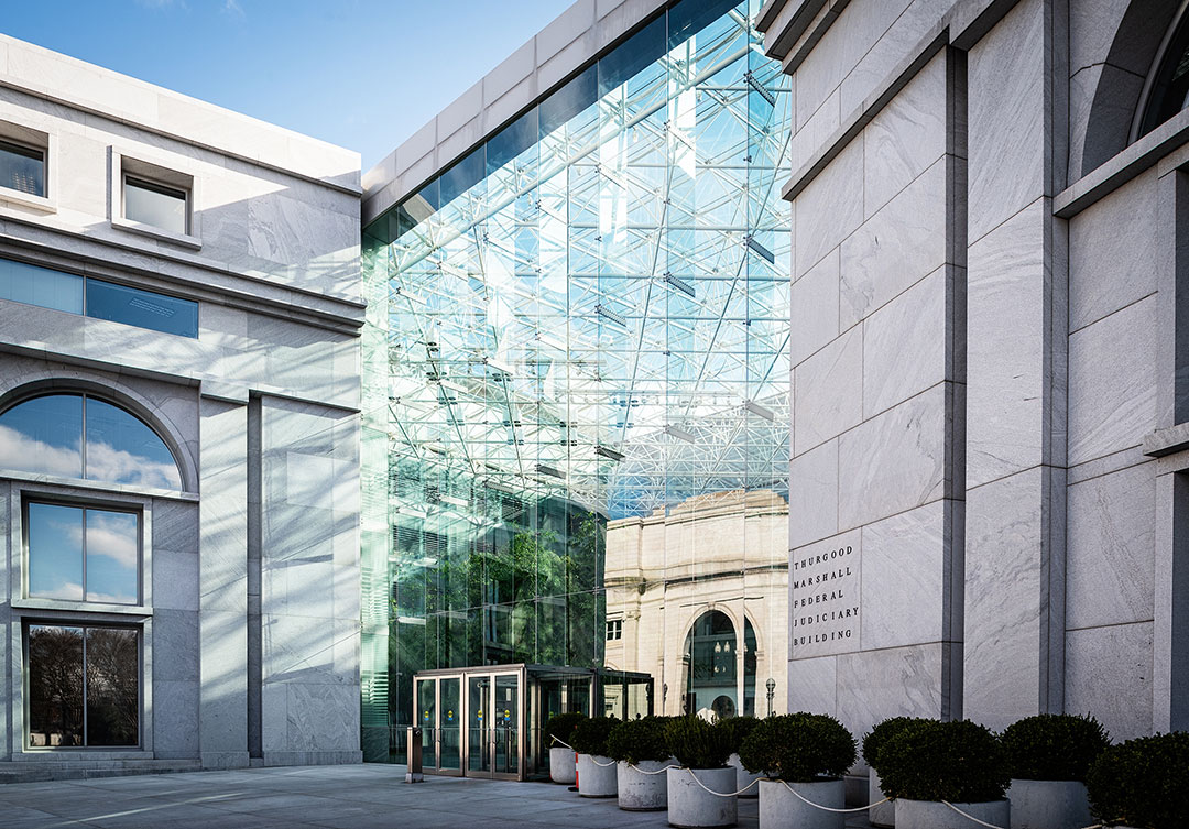 Front view of the Thurgood Marshall Federal Building, highlighting its grand entrance and neoclassical architecture.