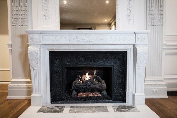 Elegant Stonework In The Cosmos Club Fireplace, Highlighting Detailed Craftsmanship And Intricate Design Elements.