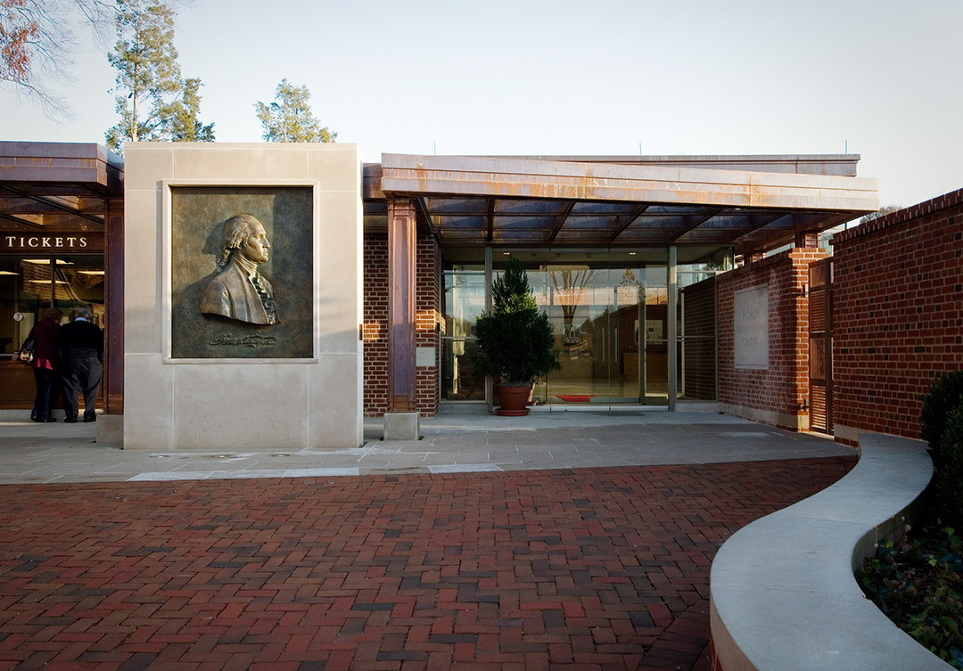 Stunning stonework at the Donald W. Reynolds Museum, highlighting intricate carvings and expert craftsmanship.