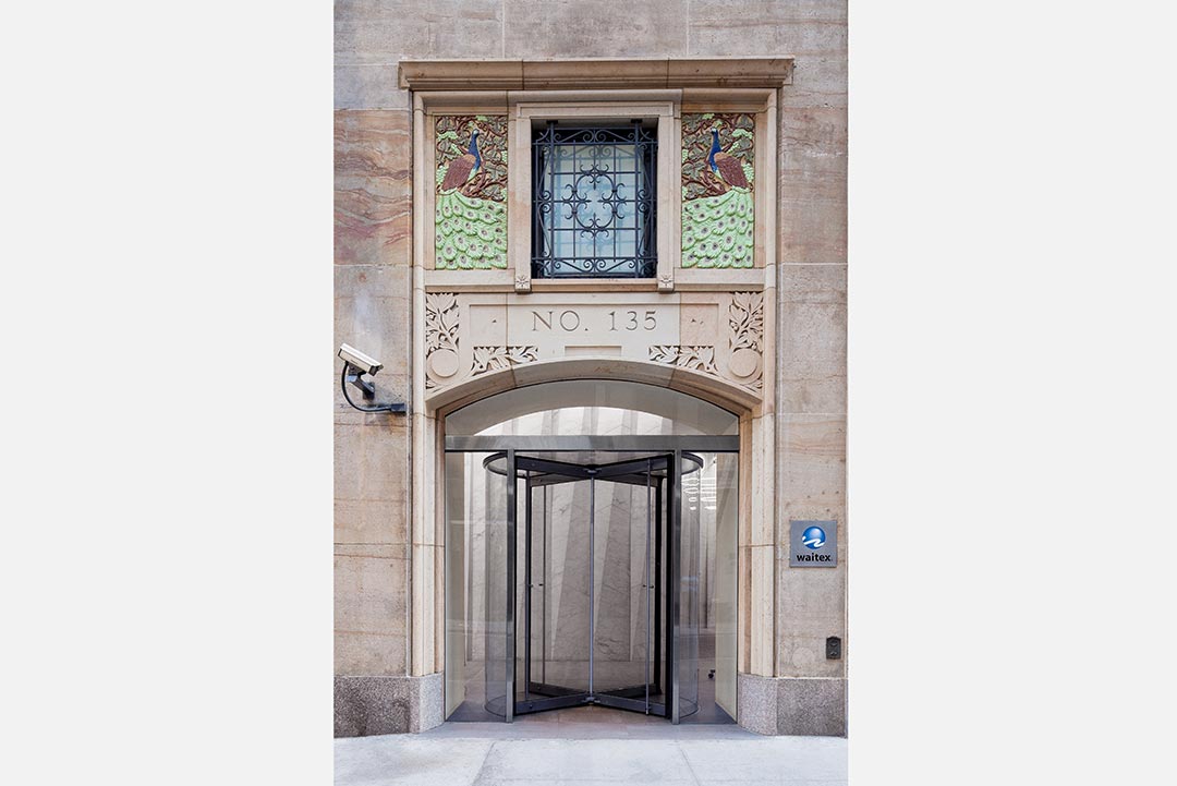 Fashion Tower project featuring elegant stonework with intricate details and expert craftsmanship in architectural design.