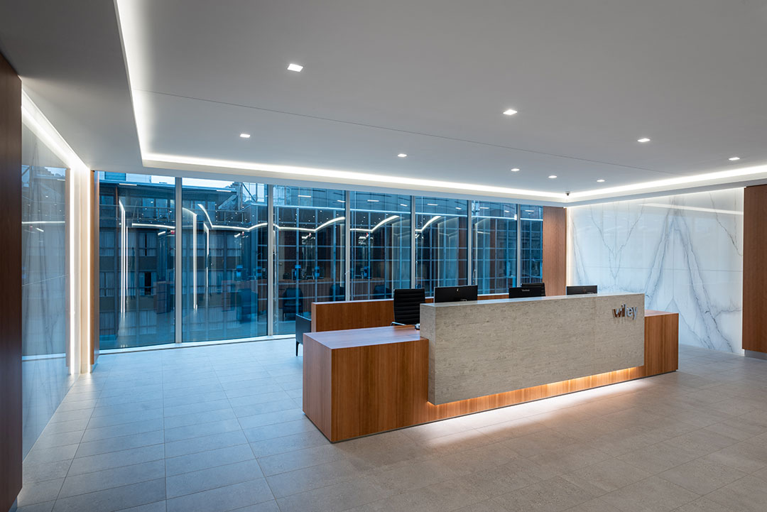 Sophisticated interior stonework at Wiley Commercial, showcasing fine carvings and expert craftsmanship in architectural design.