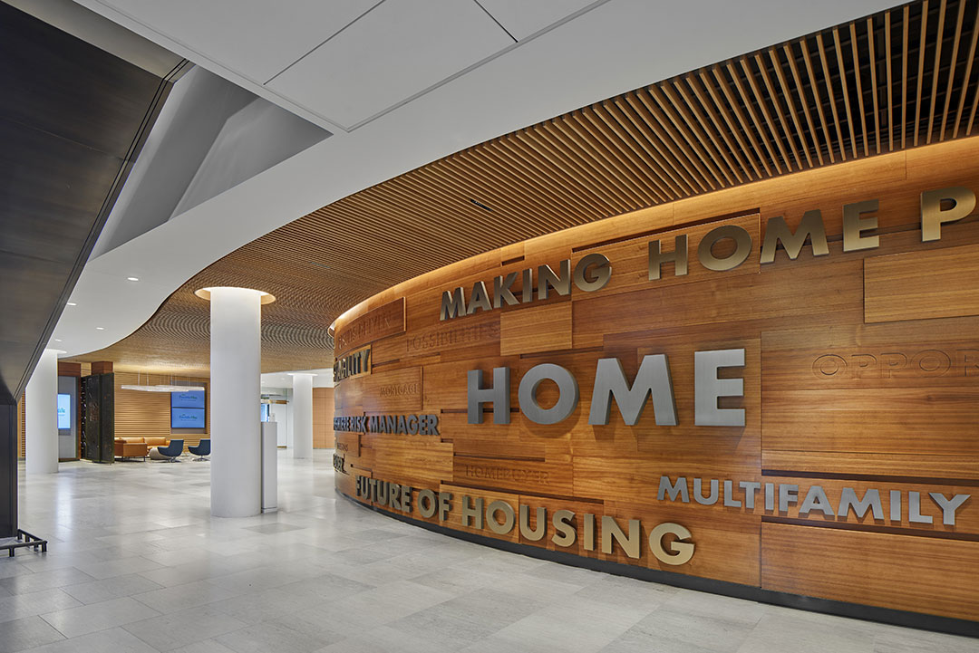Sophisticated stonework in private office lobby, showcasing detailed craftsmanship and architectural precision.
