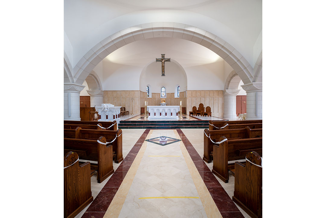 Angled view of Saint Thomas Aquinas marble statue by Rugo Stone – Specialists in Natural Stone Carving & Ecclesiastical Art Fabrication