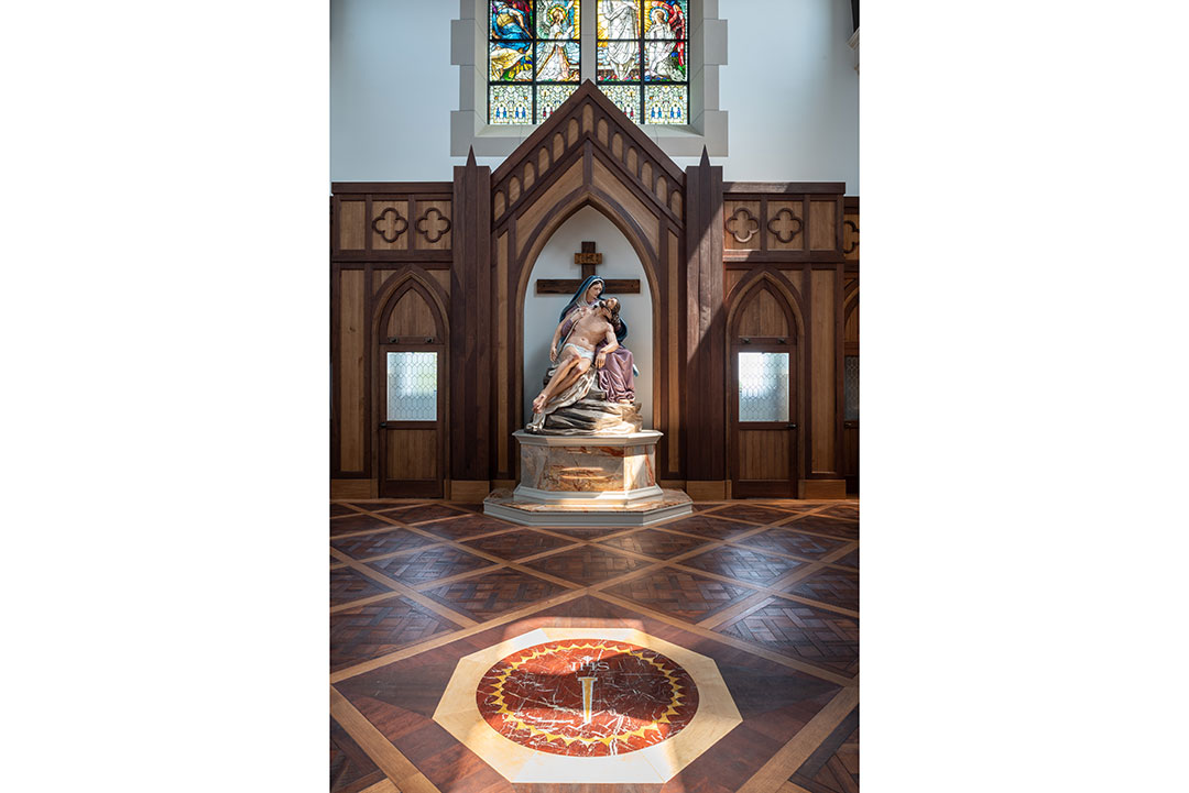 Christendom College stonework highlighting intricate craftsmanship and the use of natural stone in a prestigious academic building